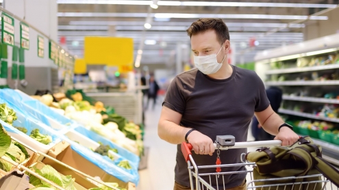 masked grocery shopper