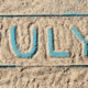 july written in sand